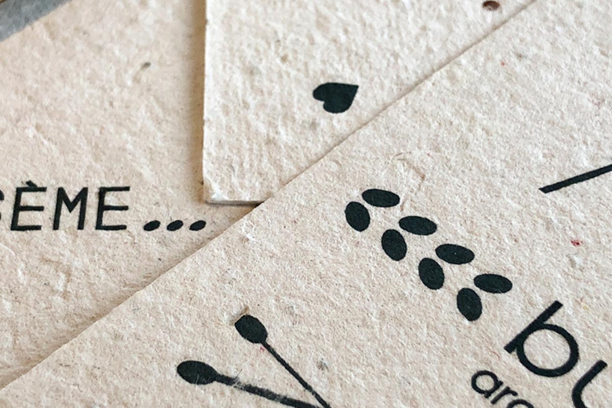 Zoom on the texture of the seeded paper used for the 2021 greeting card of the agency Bulle Architectes in Bordeaux.